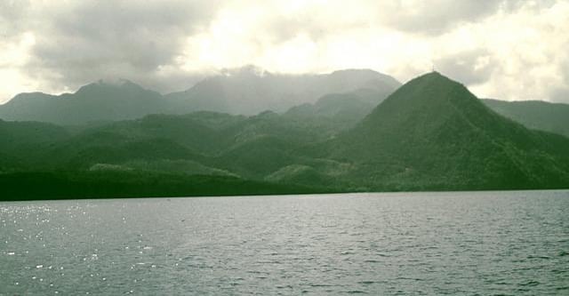 Dominica works best as a serious Caribbean trekking country built around volcanic interiors, rainforest ridges, boiling lake approaches, and day-scale summit walks rather than a resort-only island break country hero image.